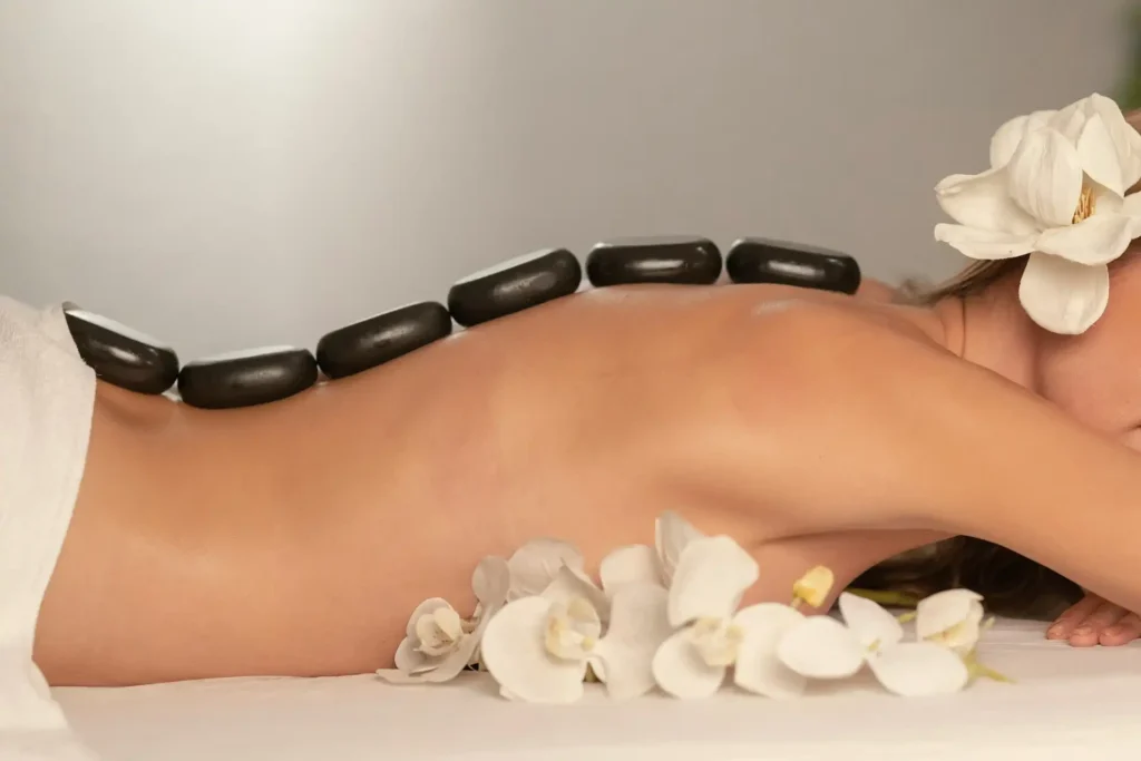 Hot stone massage treatment in Edmonton for deep relaxation