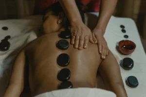 Hot Stone Massage Edmonton | Certified RMTs | Book Online 1 Hot stone massage Edmonton – therapeutic warm stones for pain relief and deep relaxation